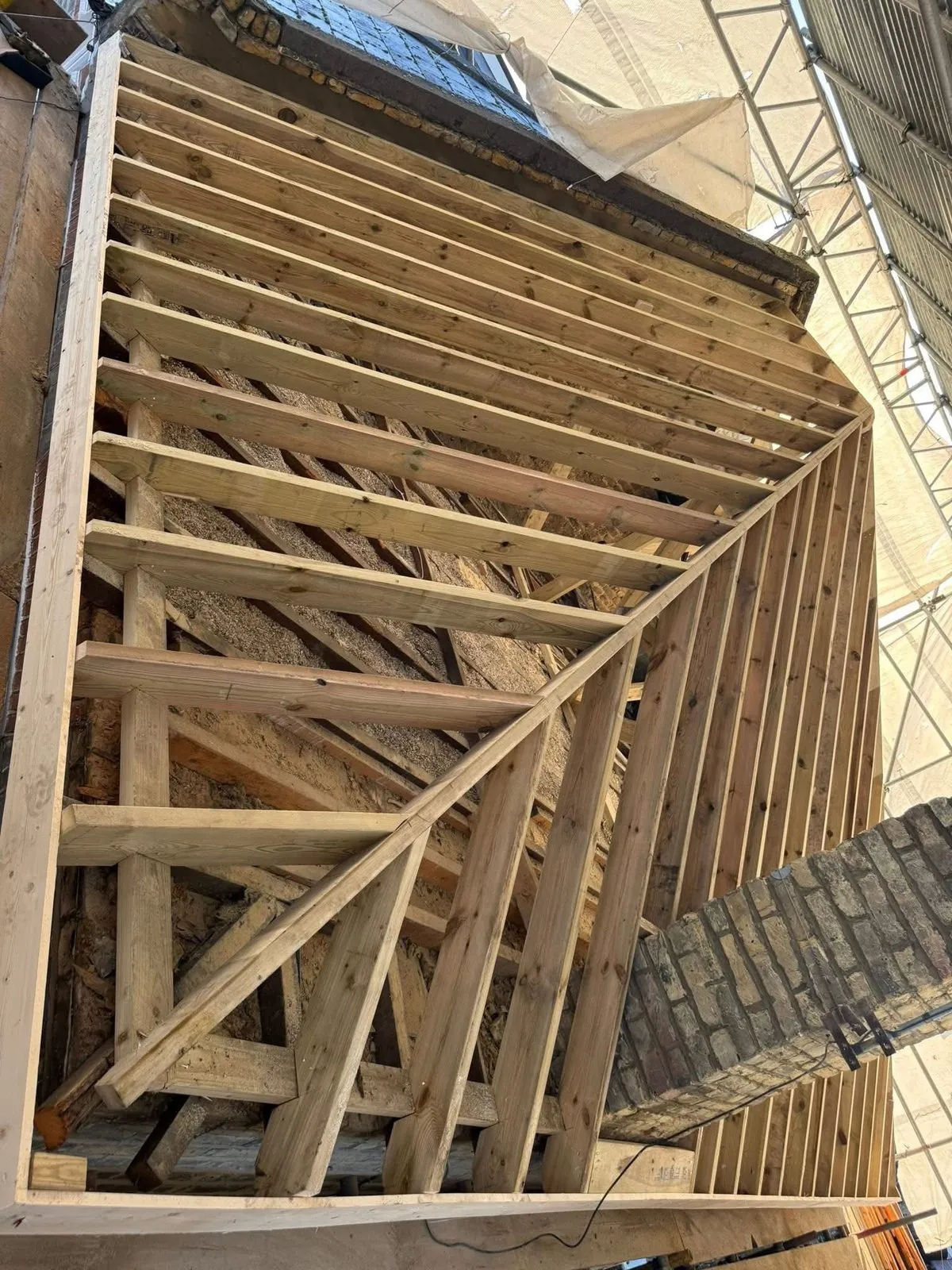 New roof timbers and rafters during a re-roof in Sennen